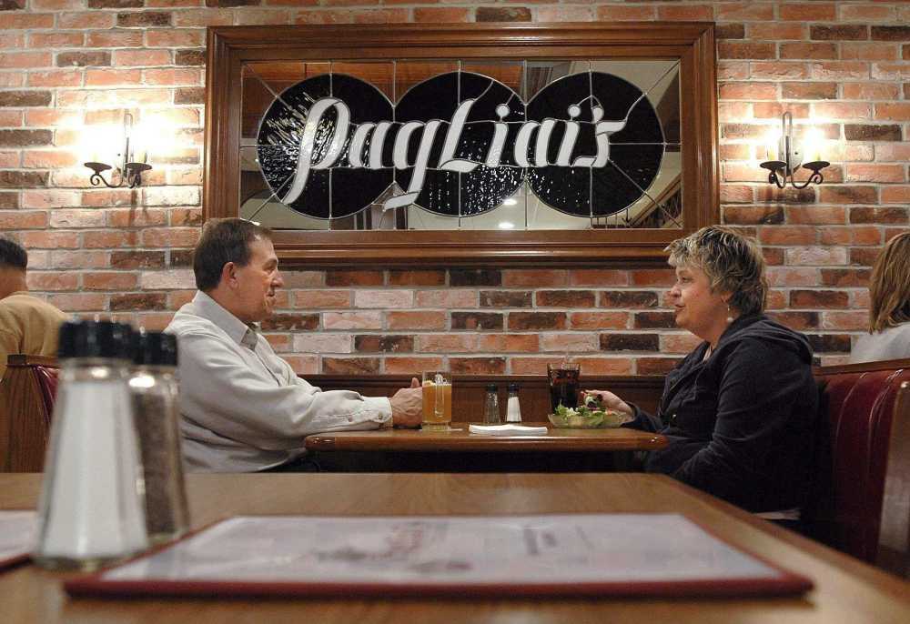 Man and woman sitting at a table inside of Pagliai's restaurant in Southeast Missouri