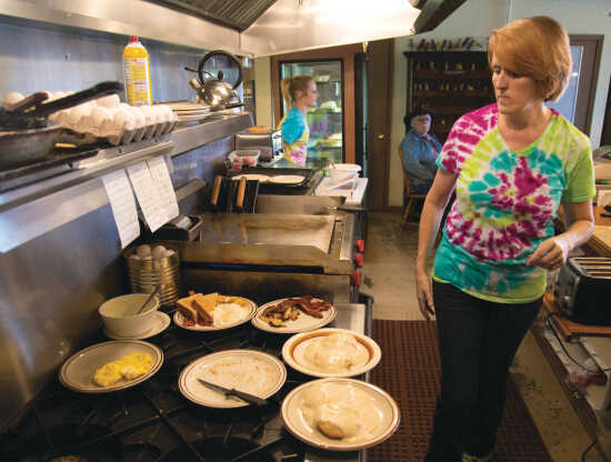 Woman cooking food at the Pie Bird Cafe located in Southeast Missouri