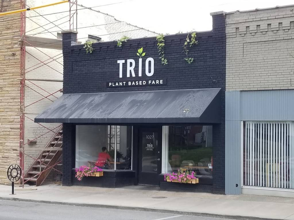 Black painted brick front of Trio Restaurant located in Southeast Missouri